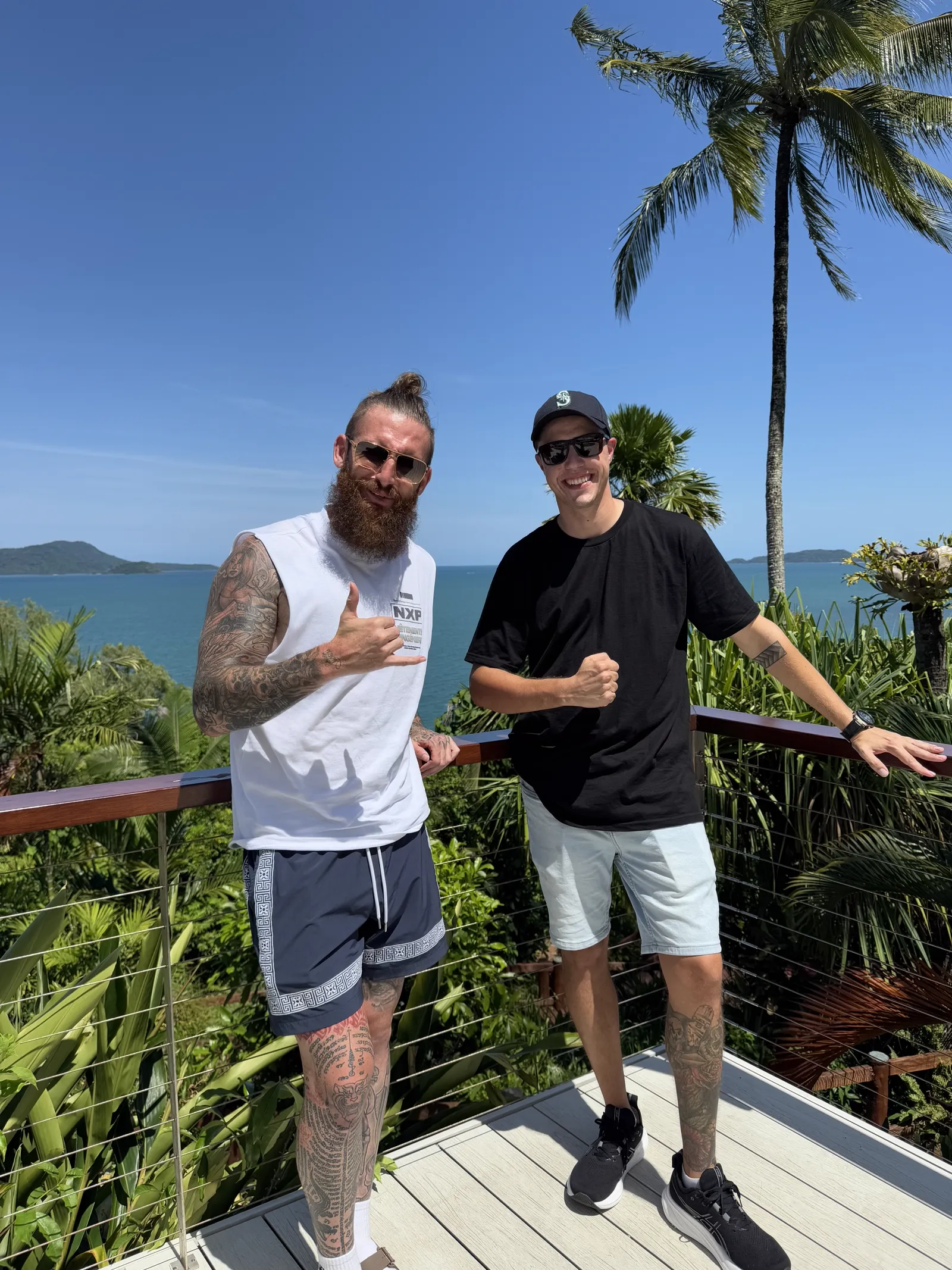 Brodie Salnitro with a community member at a coastal lookout
