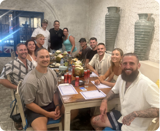 brodie salnitro hosting a dinner in bali with his team and students