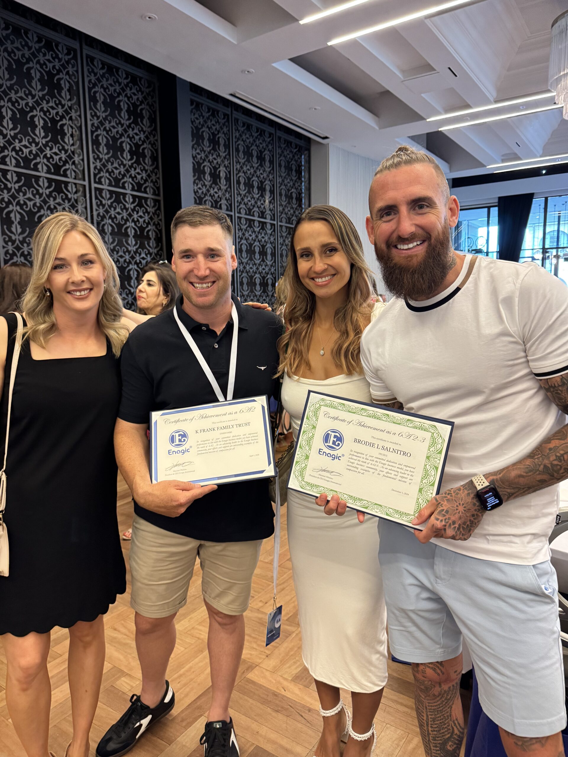 brodie salnitro and his students receiving recognition certificates